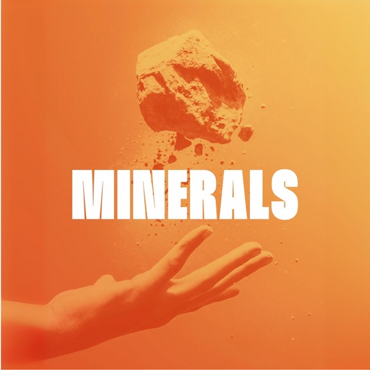 Hand holding a mineral against an orange background with 'MINERALS' text.
